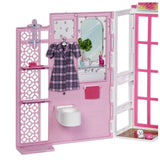 Barbie house with doll