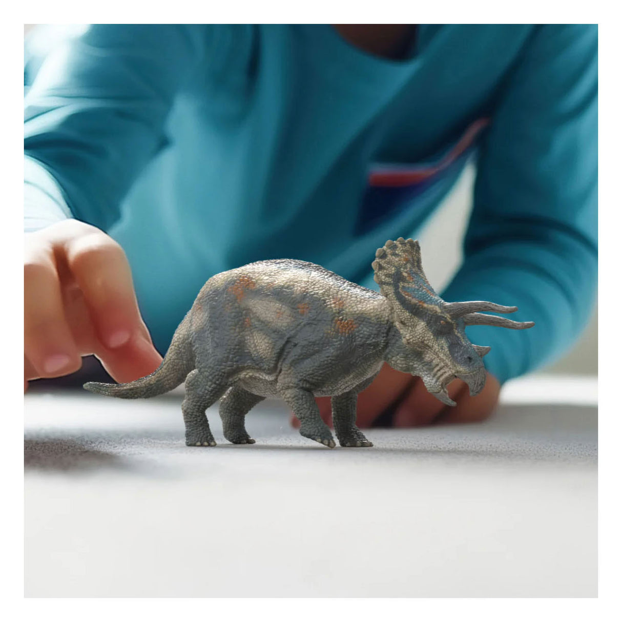 Schleich dinosaur toy triceratops with movable head.