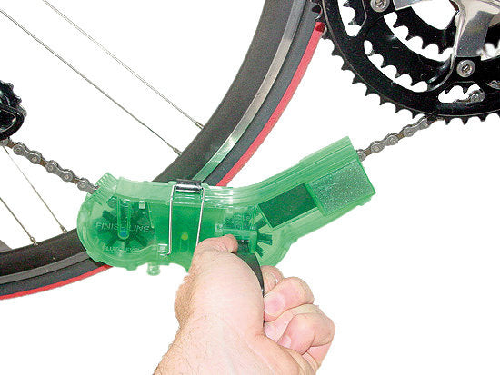 Finish line chain scrubber