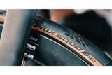 Continental Grand Prix raceband 700x25C, zwart bruin, tubeless, 25-622 ETRTO