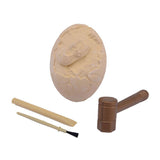 Johntoy carving dino egg fossil