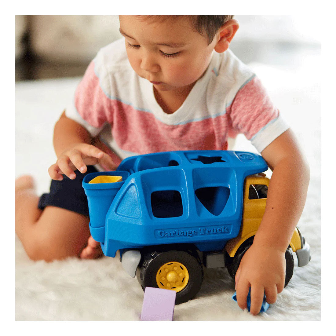 Green toys form garbage truck