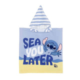 Towel poncho stitch on the beach