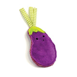 Happy pet tabby patch eggplants with catnip