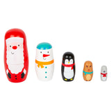 Petits poupées Matryoshka en bois à Noël