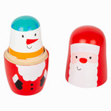 Petits poupées Matryoshka en bois à Noël