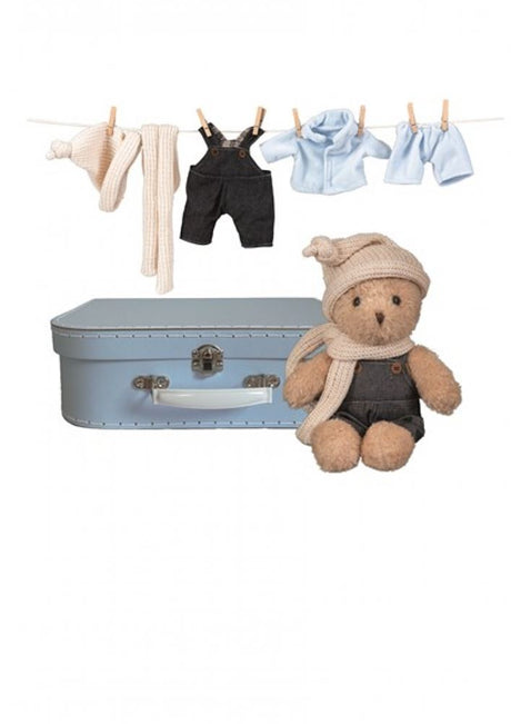 Egmont Morris with clothes in suitcase. 29x