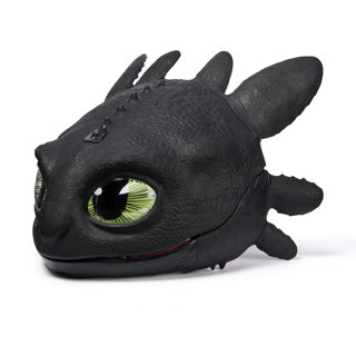 Dreamworks drakonų sukimo meistras, kaip išmokyti savo drakono kaukės žaislą be dantų.