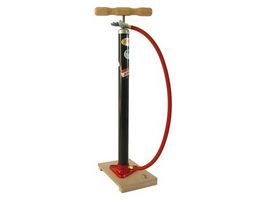 Bicycle pump on wooden board with Dunlop Valiel