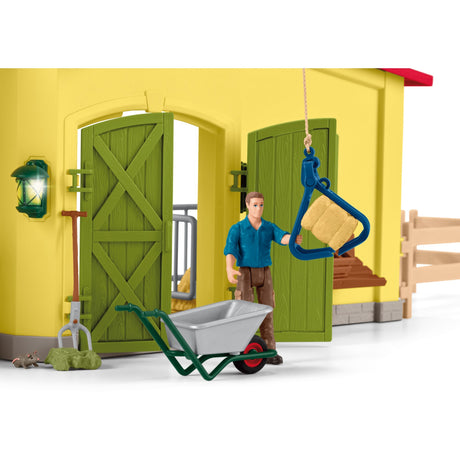 Schleich gårdsverden - stor stall, gul spillefigur